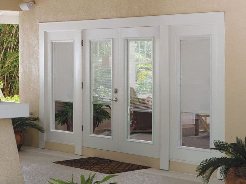 Glass French doors with white trim.